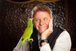 DANA DANIELS — and Luigi the Psychic Parrot!